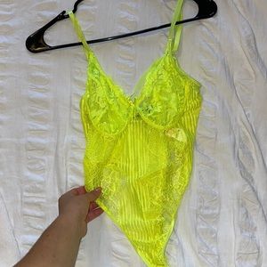 Neon yellow body suit laced